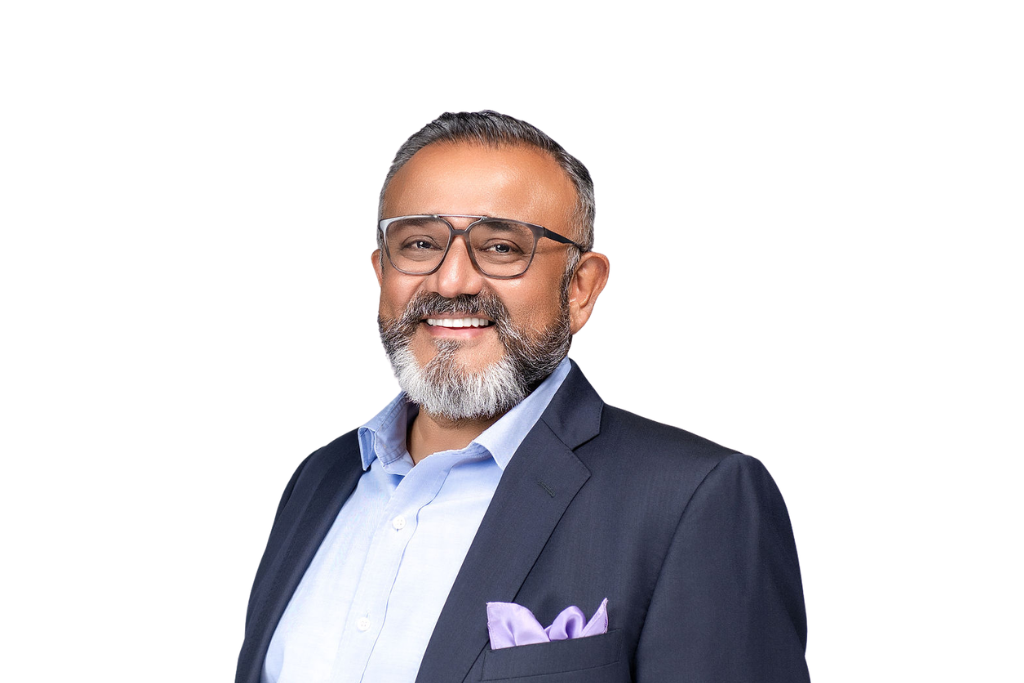 Alex Shamsuddin im blauen Anzug