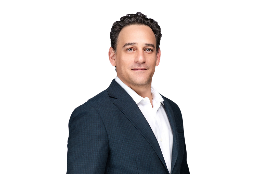 Miachel in blue suit and white shirt