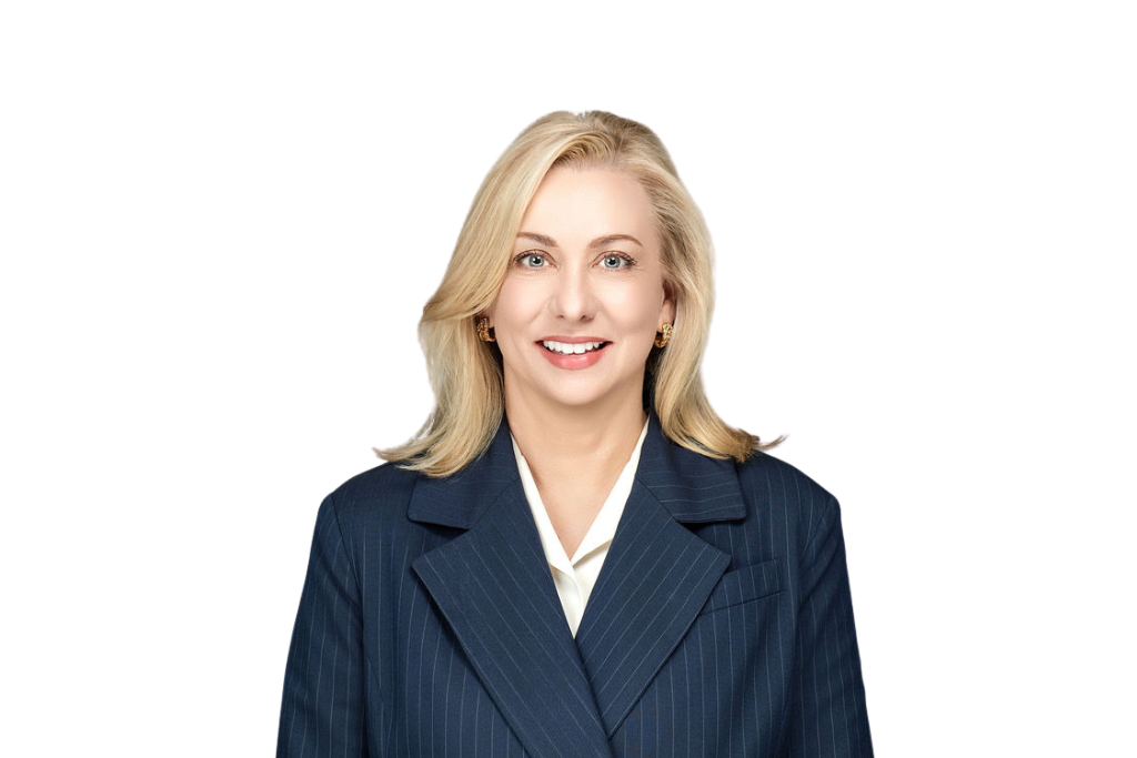 Amy in a blue suit and white blouse